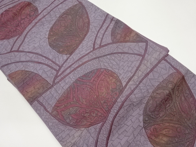 ふくれ織変わり曲線に抽象草花模様織出し名古屋帯